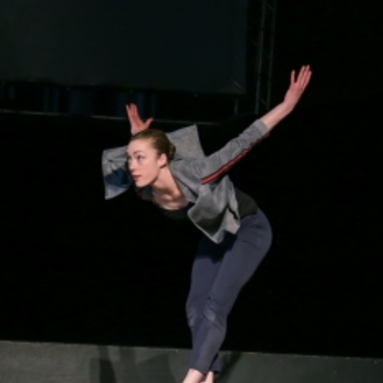Ellen Oliver dancing on a stage