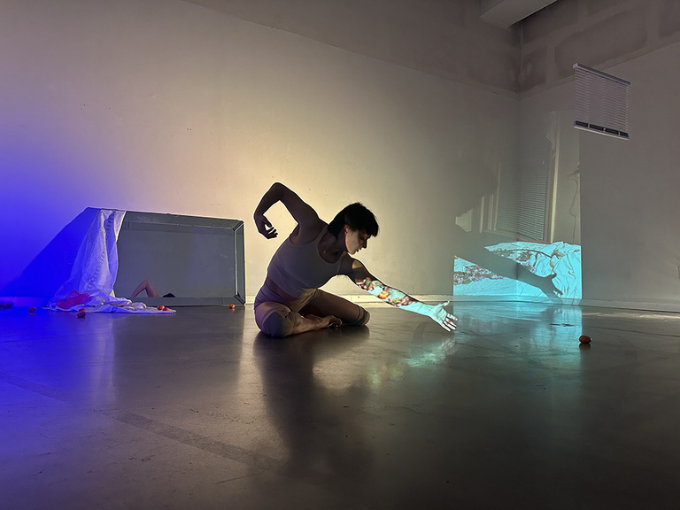 MFA student working with digital projections
