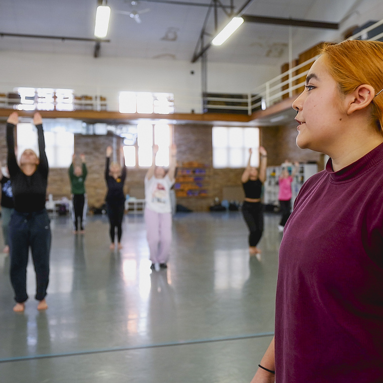 Katelyn Perez leads students in rehearsal