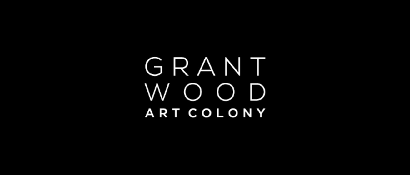 white grant wood art colony logo on black background