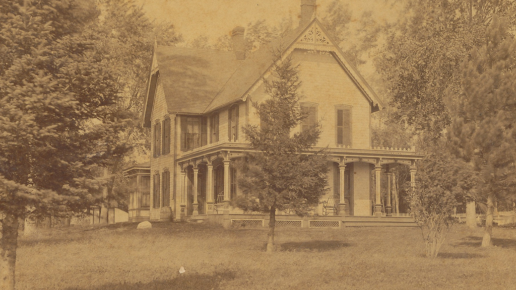 vintage sepia-toned photograph of a victorian home