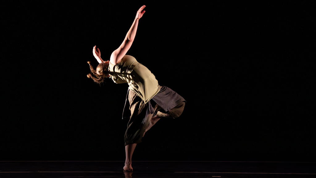 Madison Burkhart (BFA) performing her work "The World Ends With You" on stage during the BFA Concert in spring 2026