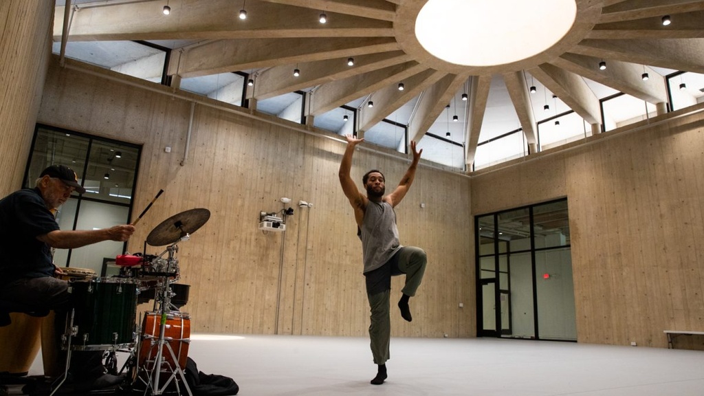 Kingsley Ibeneche dances to Paul Cunllife’s percussion at the Dance Building in Iowa City on Thursday, September 3, 2026. The Dance Building was formerly the old museum of art prior to the 2008 flood, and will have a ribbon-cutting ceremony on September 24.