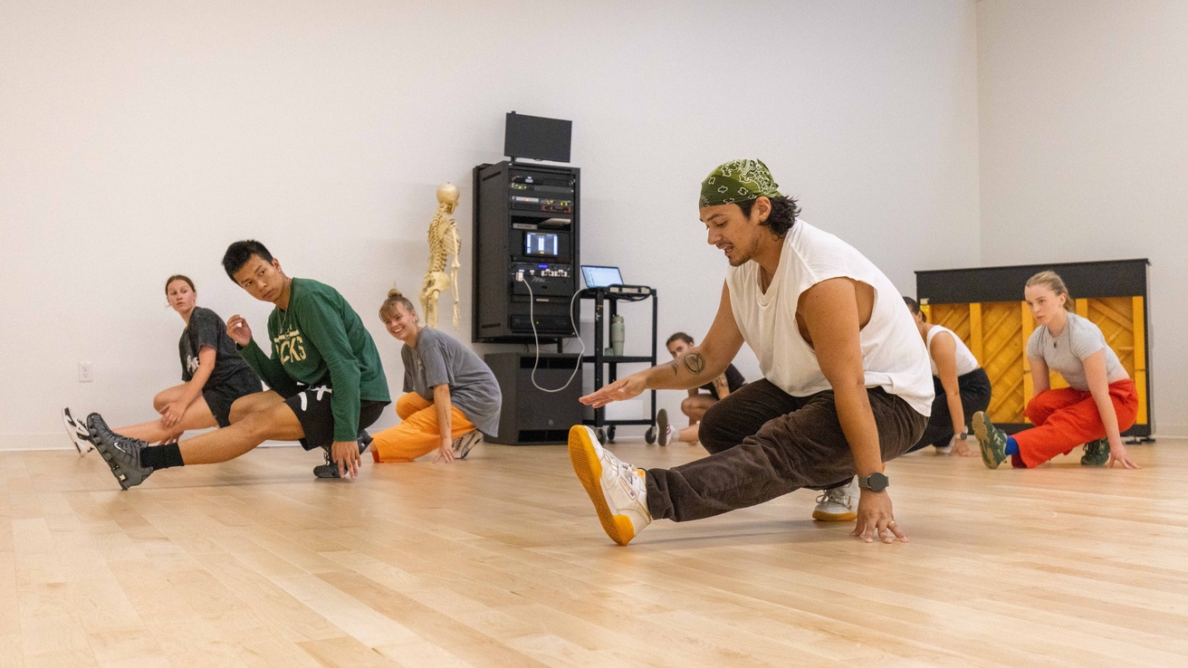 Instructor Ricky Medina teaching students in Major Contemporary Movement Practices III
